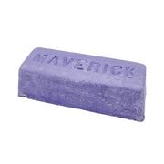 Assortment of metal polishing compound bars in various colors for buffing and polishing different materials.