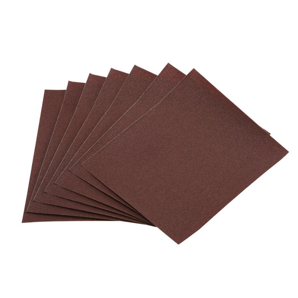 Alt text: Assorted 9x11 sanding sheets for woodworking, metalworking, and automotive applications, featuring different abrasive materials.